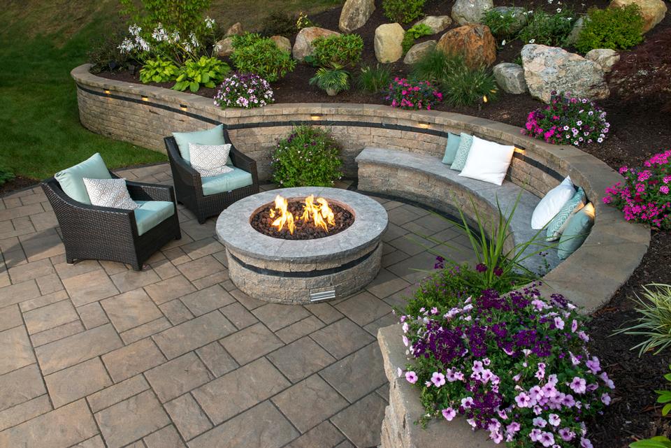 Outdoor fireplace by landscapers near me in Weatogue CT