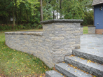 Granite steps to lawn from blue stone patio