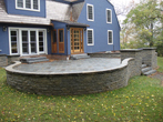 Patio showing curved seating wall