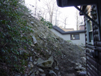 Before engineered wall, showing hill erosion